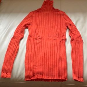Orange turtleneck